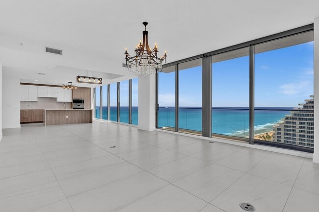 Building Photo - Stunning High-Rise Condo with Ocean Views | Prime Beach Location