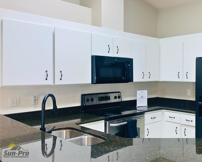 Building Photo - 5988 Sawgrass Point Dr