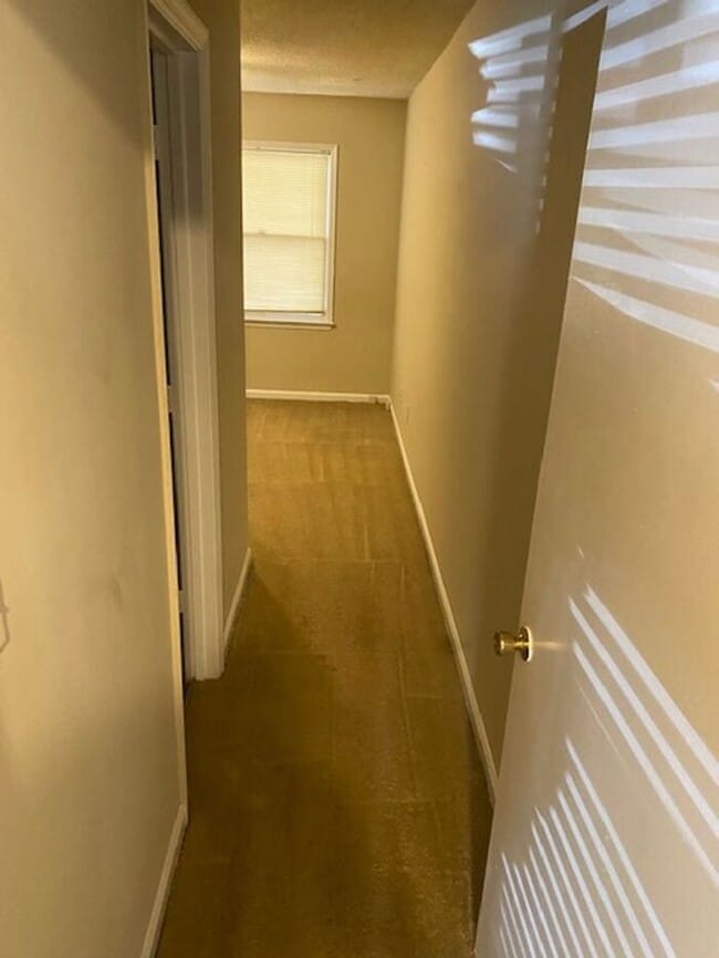 Building Photo - NOW AVAILABLE! Charming 2-Bedroom, 2-Bathroom Single-Level Townhome