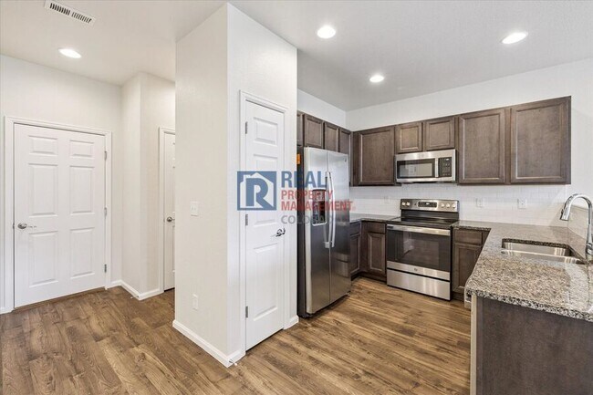 Building Photo - 19219 E 64th Ave