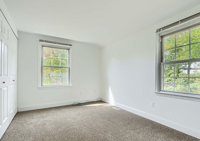 Building Photo - Updated End-of-Group Townhome with Finished Lower Level, Fenced Yard & Community Pool