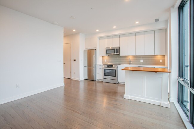 Building Photo - Stunning 1 Huge Den/1 Full BA Den Condo in...