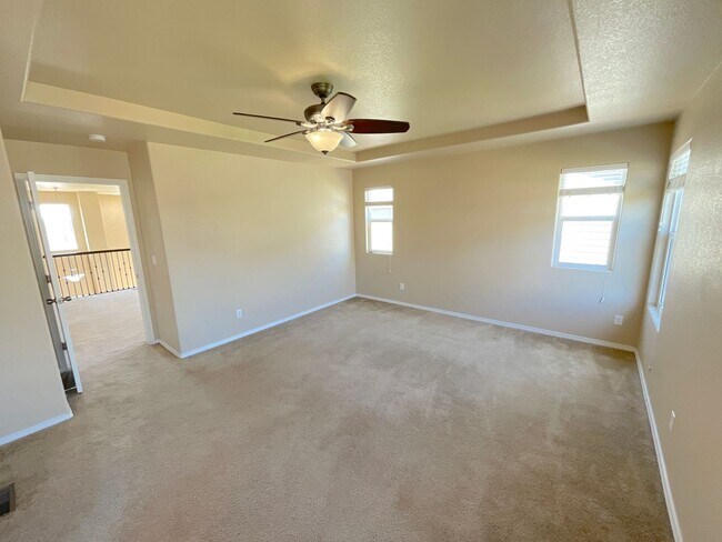 Building Photo - 4 Bedroom Home Available Near Voyager Pkwy...