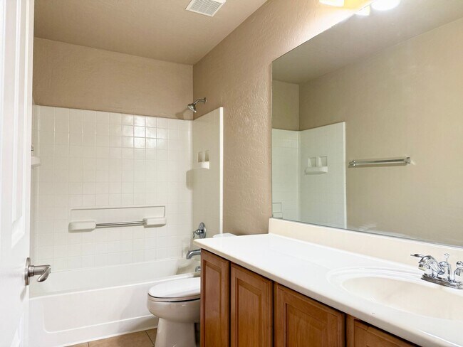 Building Photo - FIVE BEDROOMS, THREE FULL BATHROOMS, THREE...