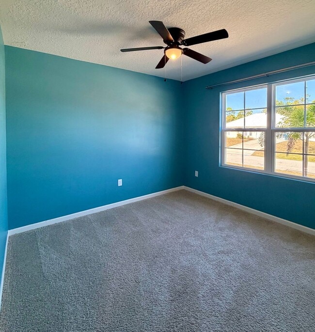 Building Photo - Palm Bay Pool Home Stunner!