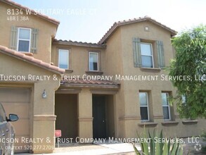 Building Photo - Nestled to the west of the Tucson mountains