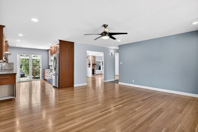 Building Photo - 2,003 Sq Ft Modern 4BR/2BA: Solar, EV Charging & Private Orchard!