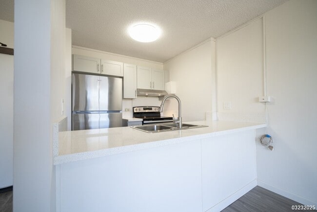 Building Photo - 98-450 Koauka Loop #1405