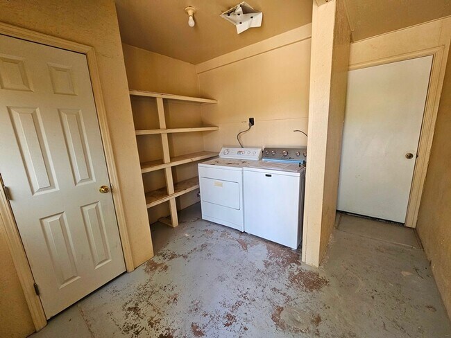 Building Photo - Property with a carport and laundry.