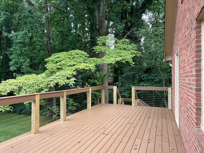 Building Photo - Four Bedroom Brick Home in Denver with finished basement and Seasonal Lake Views!