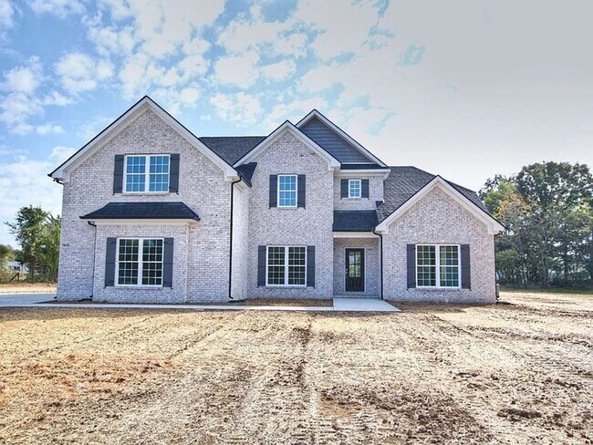 Primary Photo - Situated on over 3 acres right in a growin...