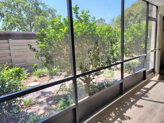 Building Photo - Bird Bay Village Annual Rental – Furnished 1st Floor Unit with Covered Parking