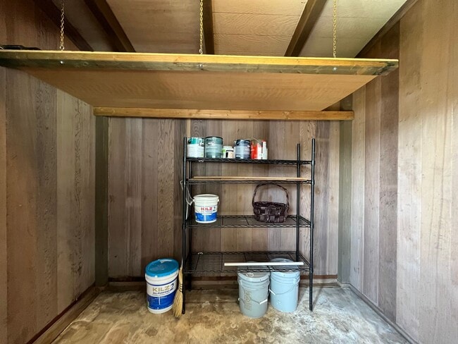 Building Photo - Enchanted Lake 3/2/2 Car Carport