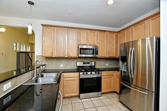Building Photo - 1310 W Parmer Ln