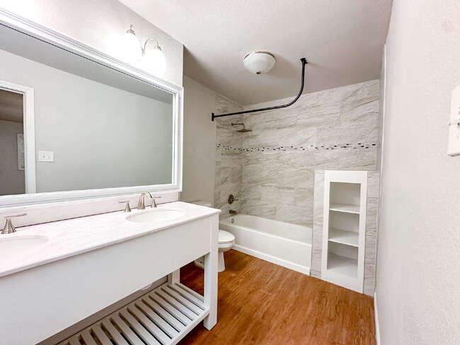 Building Photo - Spacious Living & Modern Upgrades