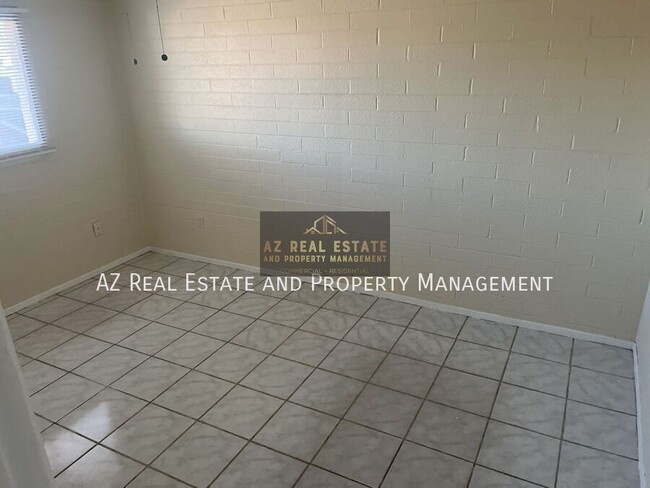 Building Photo - 3841 N 63rd Dr