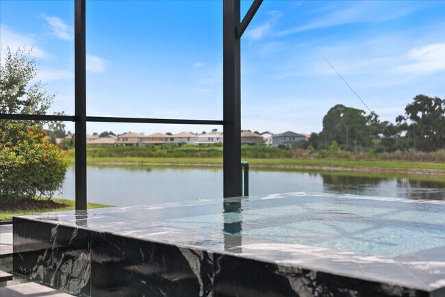 Building Photo - Luxury Home w/ Pool, Outdoor Kitchen, Car Lift, & Water View In Parrish!