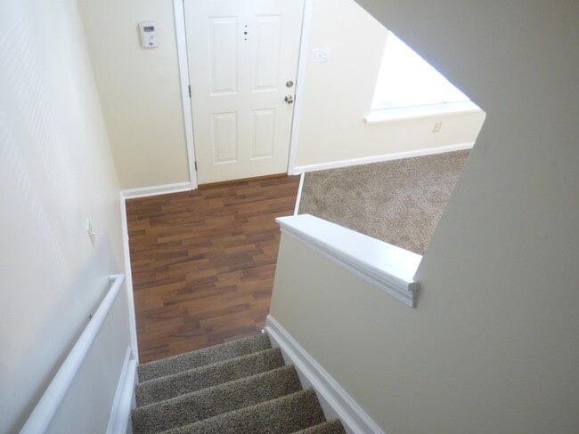 Building Photo - COMING SOON! Spacious Townhouse, W/D Hookups, Off-Street Parking, All Electric!