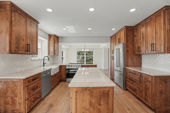 Building Photo - Backs to Open Space | Over 4,000 Sq Ft | Updated Kitchen + Solar