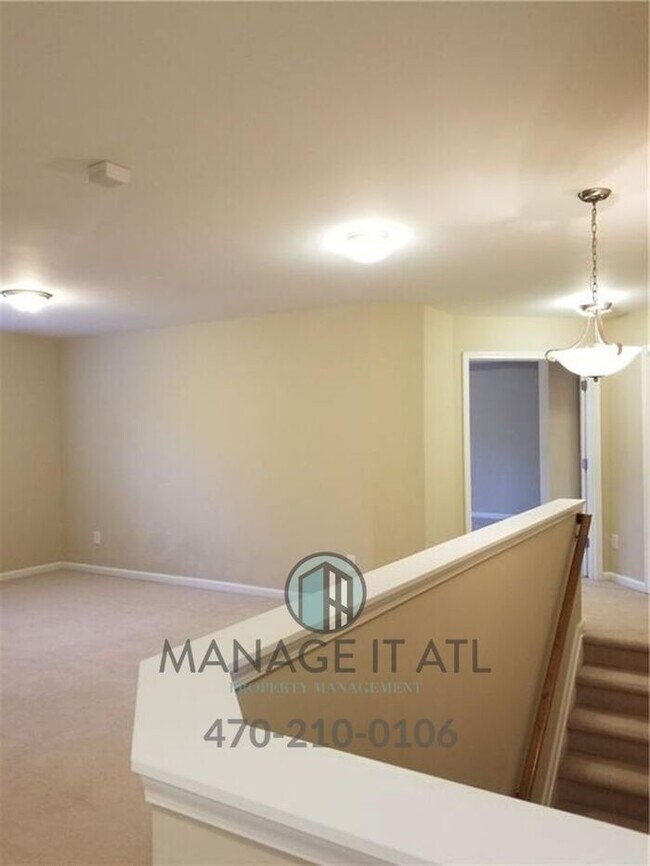 Building Photo - Beautiful 5BR/4BA Home in Just 5 Min from MALL OF GA