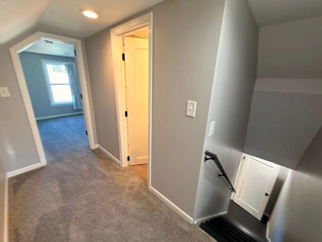 Building Photo - This spacious four-bedroom, two-bathroom