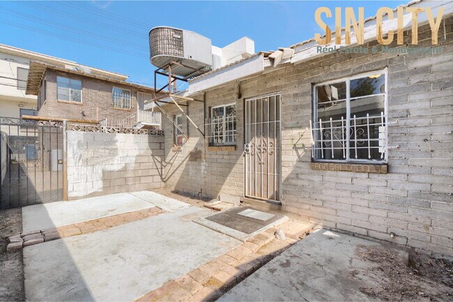 Building Photo - "Charming 1-Bed Duplex with Hardwood Elegance in Downtown Las Vegas!"