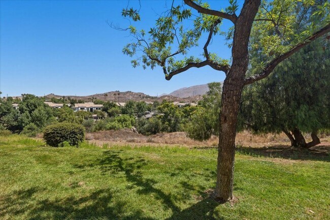 Building Photo - Move-In Ready Condo with Premium Community Amenities