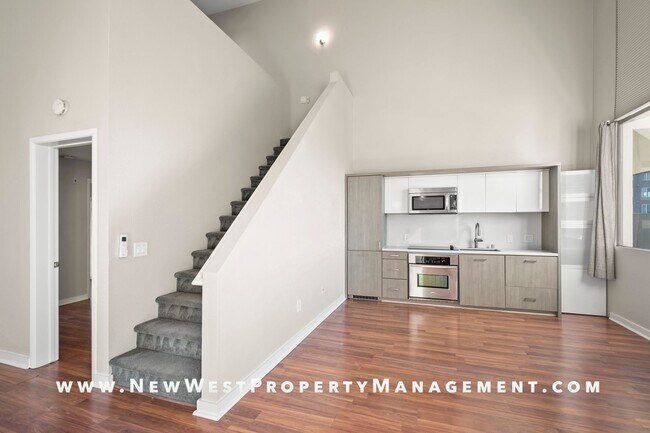 Building Photo - Views, Views, Views! Stunning Top-Floor Little Italy 2-bedroom Loft at The Waterfront!