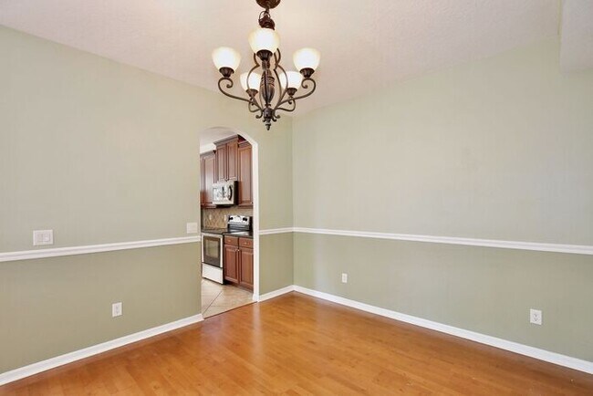 Building Photo - Luxury 3BR/3BA Townhome with 2-Car Garage in Gated Greystone – Sanford