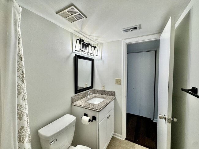 Building Photo - Just Updated & Ready NOW! A Pet Friendly H...