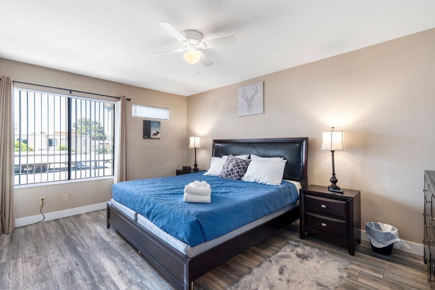 Masters bedroom with king bed - 3600 N Hayden Rd