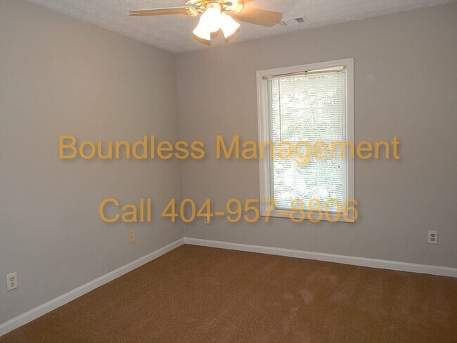 Building Photo - Larger Than It Looks! 3 BR/2.5 BA Town Hom...