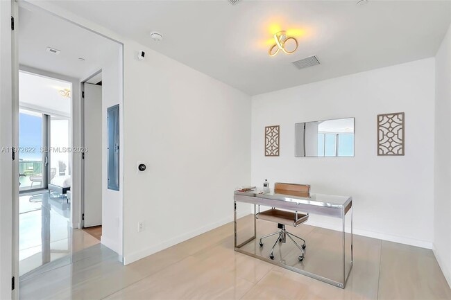 Building Photo - 18975 Collins Ave