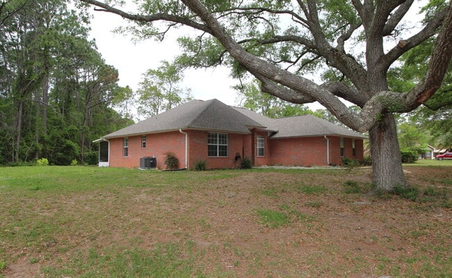 Building Photo - Stunning West Pensacola Home on Nearly an ...