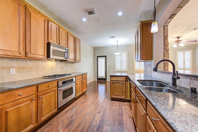 Building Photo - 14559 Gleaming Rose Dr