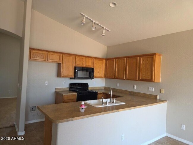 Building Photo - 3135 N 127th Ave