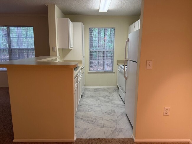 Building Photo - Private End Unit - First Floor - Reserve at Woodbridge