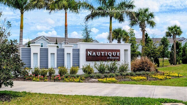Building Photo - EXCEPTIONAL AND SPACIOUS FURNISHED TOWNHOME WITHIN WATERSIDE- NAUTIQUE!