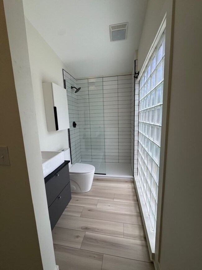 Building Photo - Vaulted Ceilings & Hardwood Floors in This Charming Indianapolis L