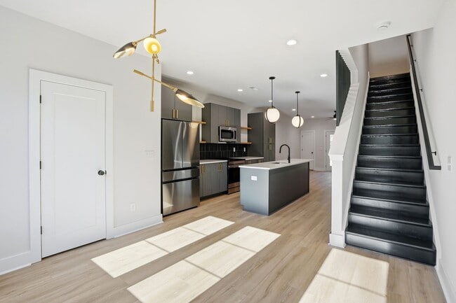 Building Photo - Bishop at Briar Creek, an end-unit townhome