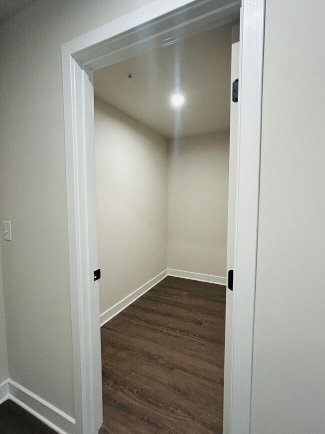 Building Photo - New Construction • 4 BR • 2 Full / 2 Half BA • End Unit Townhome in Village Town – Fayetteville’s...