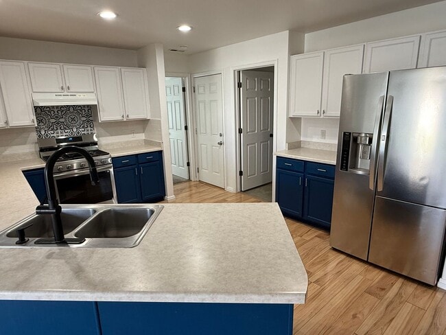 Building Photo - Beautiful patio home with 2 car garage and...