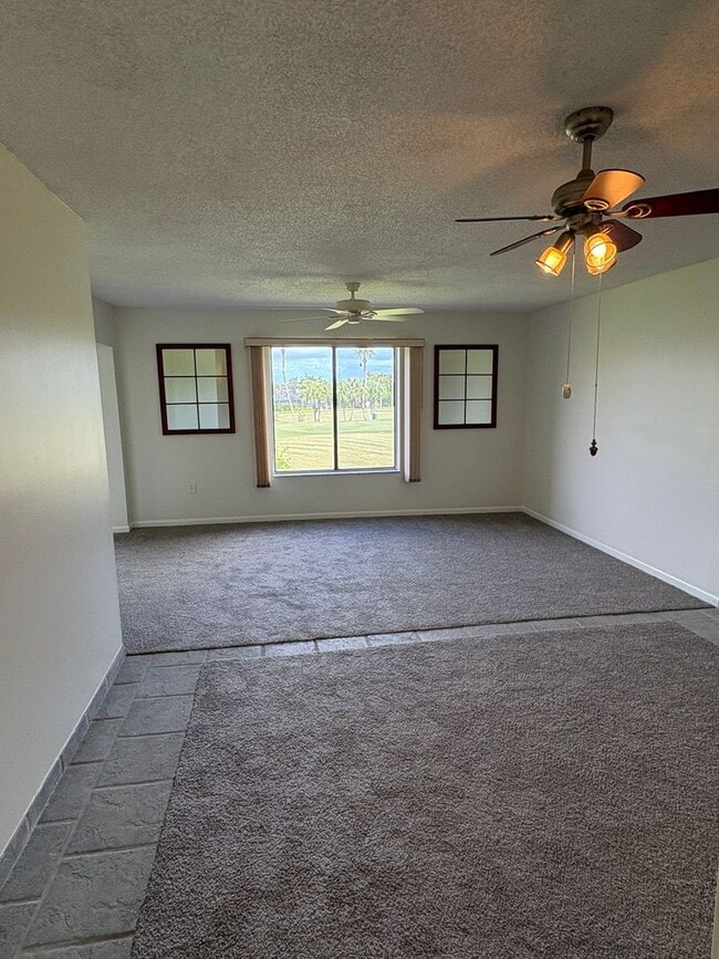 Building Photo - (55+) 2/2 Condo in the Peaceful Miles Grant Golf Course Community