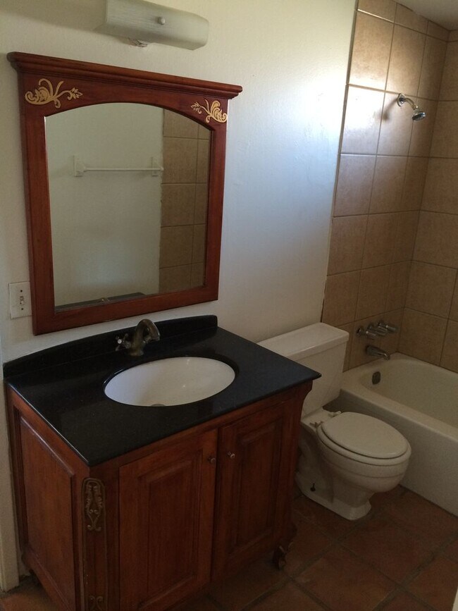 Building Photo - Roomy 6-Bedroom Home with Pool Available J...