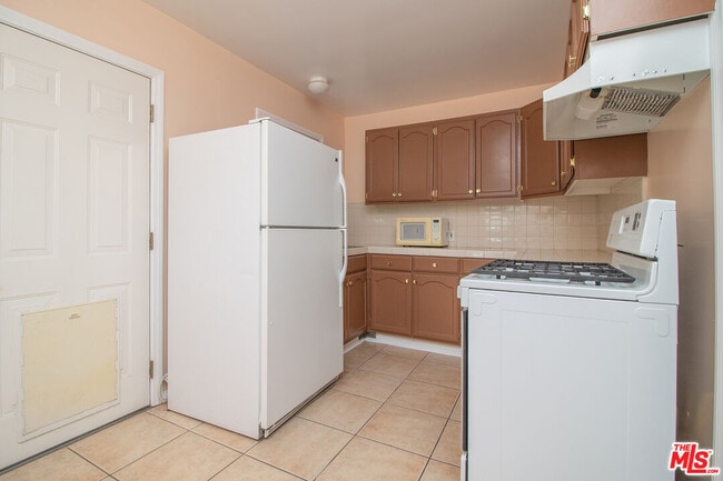 Building Photo - 5107 Overland Ave