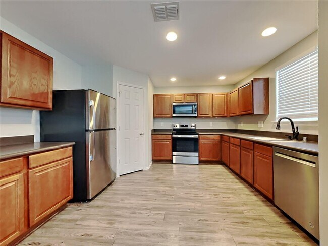 Building Photo - 5 BR/3BA | 3-Living areas | 2-Car Garage | Private Pool!