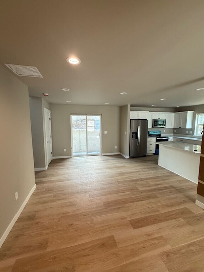 Building Photo - New home ready for you!  Spacious, bright, all appl. detached garage!