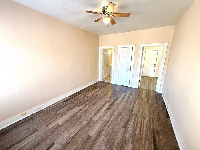 Building Photo - *COMING SOON* Charming 1-Bedroom Duplex With Laminate Flooring Throughout + Fenced Backyard