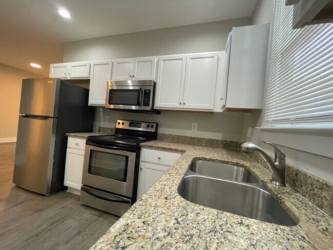 Building Photo - PRE-LEASING FOR AUGUST 2026!