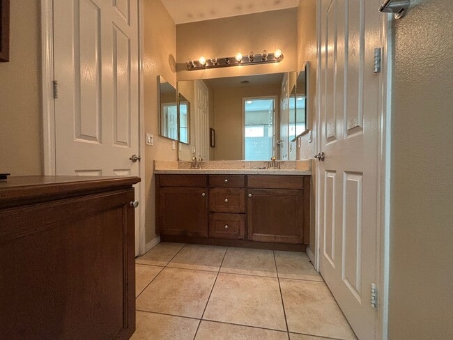 Building Photo - Short Term Lease - Grand 4-Bedroom Home with Entertainer's Yard in Gated River Village!